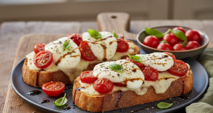 Tomaten Mozzarella Toast mit Basilikum auf Blech