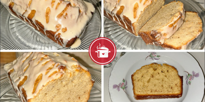Ein glasiertes Vintage Eggnog Bread in einer Kastenform auf einem rustikalen Holztisch.